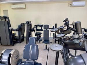 a room filled with lots of exercise equipment at The Sojourner By Genesis in Ikeja