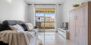 A television and/or entertainment centre at Albeniz Apartments