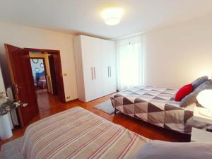 Posteľ alebo postele v izbe v ubytovaní Casa Dante