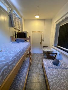 Postel nebo postele na pokoji v ubytování Rooms Asceric