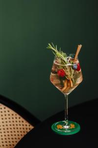 a drink in a wine glass on a table at Hyatt Regency Nice Palais de la Méditerranée in Nice