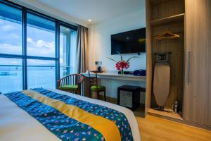 TV a/nebo společenská místnost v ubytování Beach Hotel Guraidhoo