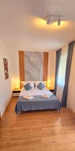 En eller flere senge i et værelse på Aquamarine Jaz Montenegro + 58 billeder