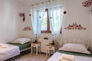 Ένα ή περισσότερα κρεβάτια σε δωμάτιο στο Holiday Home Beti with heated pool +68 φωτογραφίες