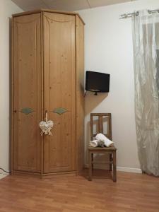TV a/nebo společenská místnost v ubytování B&B Rosso Pila