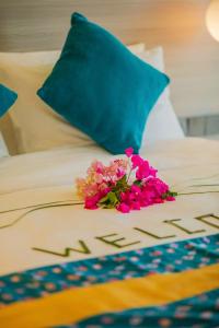 Voodi või voodid majutusasutuse Beach Hotel Guraidhoo toas