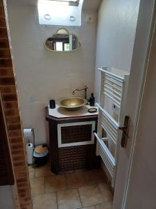 Koupelna v ubytování Appartement en pierre au calme