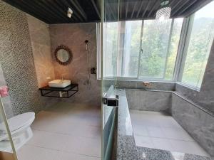Koupelna v ubytování 晟品溫泉湯旅 宜蘭縣058號