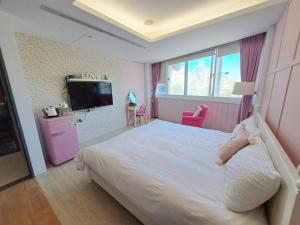 TV a/nebo společenská místnost v ubytování 晟品溫泉湯旅 宜蘭縣058號