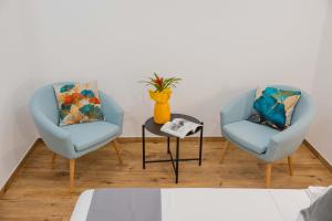 Posezení v ubytování Humboldt Luxury Apartment & Rooms Taormina + 40 fotografií