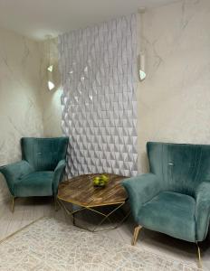 Posezení v ubytování Элитная квартира в самом центре города