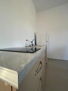 Η κουζίνα ή μικρή κουζίνα στο Karafili House