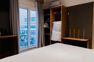 Katil atau katil-katil dalam bilik di Hotel Charf