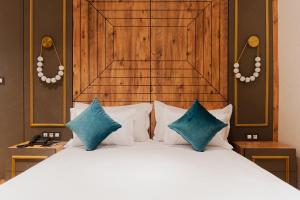 Katil atau katil-katil dalam bilik di Hotel Charf