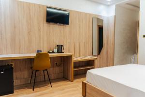 Televisyen dan/atau pusat hiburan di Hotel Charf