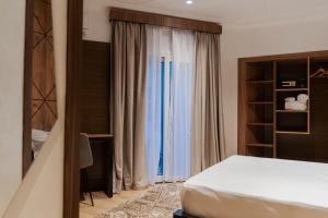 Katil atau katil-katil dalam bilik di Hotel Charf