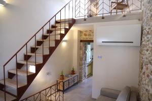 Foto dalla galleria di Kapetanospito Vacation Homes a Kardámyla