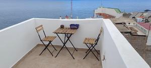 En balkon eller terrasse på Seaview + 23 billeder