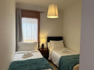 Łóżko lub łóżka w pokoju w obiekcie Villa Ancor by Villalia