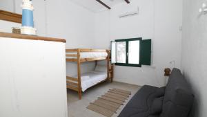 Postel nebo postele na pokoji v ubytování Mas Ranxo Gran