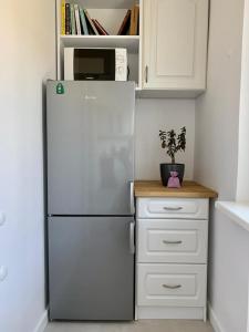 Dapur atau dapur kecil di Dom z widokiem na Wisłę, ogrodem i parkingiem AC Progres