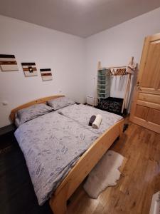 Postel nebo postele na pokoji v ubytování Sunrise Apartment