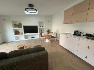 Η κουζίνα ή μικρή κουζίνα στο Charmante Maison 2 pièces RER B - PARIS