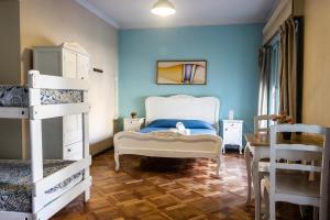 Postel nebo postele na pokoji v ubytování Hostal Providencia + 37 fotografií