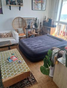 Posezení v ubytování Appartement avec vue panoramique