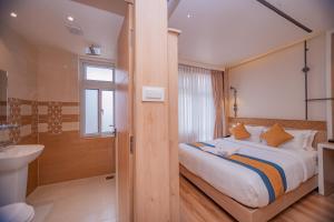 Postelja oz. postelje v sobi nastanitve Hotel Vistara
