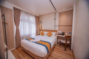 Postelja oz. postelje v sobi nastanitve Hotel Vistara