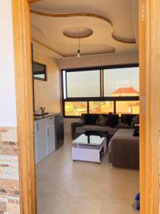 Postel nebo postele na pokoji v ubytování Appartement sfiha