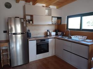 Kuchyňa alebo kuchynka v ubytovaní Nature Home Eco-friendly Pet-friendly