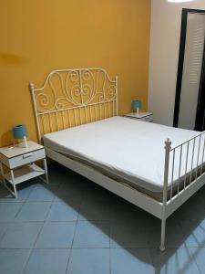 Katil atau katil-katil dalam bilik di Villa Cirellese