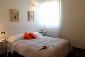 A bed or beds in a room at Casa Vacanza Villa Filomena