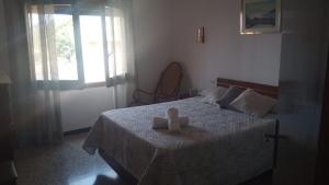 Postel nebo postele na pokoji v ubytování Casa rural Can Casanovas
