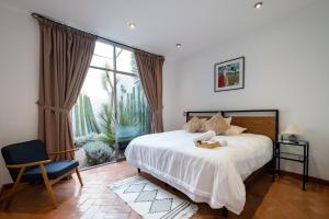 Postel nebo postele na pokoji v ubytování Casa Malen + 30 fotografií