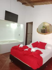 Postel nebo postele na pokoji v ubytování Libélula finca-hotel