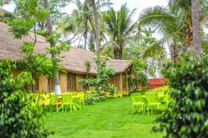 En hage utenfor Tamarind Tree Way Side Amenities