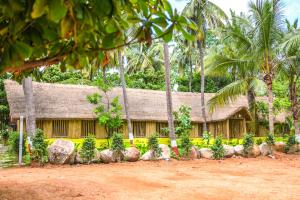 En hage utenfor Tamarind Tree Way Side Amenities