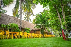 En hage utenfor Tamarind Tree Way Side Amenities