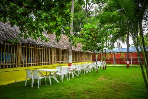 En hage utenfor Tamarind Tree Way Side Amenities