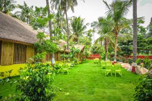 En hage utenfor Tamarind Tree Way Side Amenities
