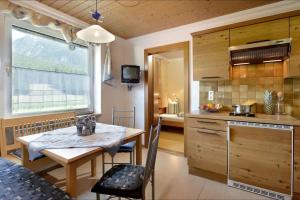 Kuchyň nebo kuchyňský kout v ubytování Appartement mit Kaiserblick