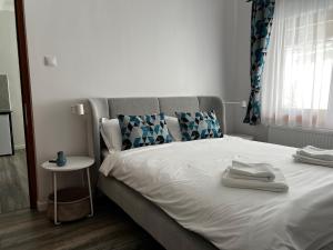 Postel nebo postele na pokoji v ubytování Casa Katona