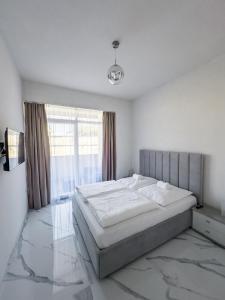 Ένα ή περισσότερα κρεβάτια σε δωμάτιο στο Silver Moon Residence 3