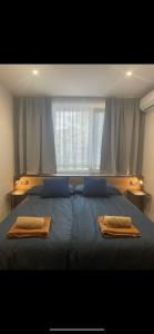 Postel nebo postele na pokoji v ubytování Apartmánový dom Ametyst