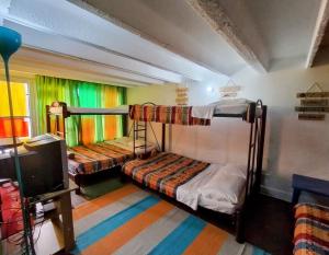 Llit o llits en una habitació de ZIPA HOSTEL