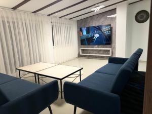 Μια τηλεόραση ή/και κέντρο ψυχαγωγίας στο Idealapartments LLC Penthouse