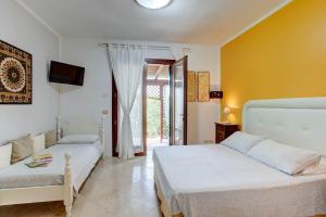 Postel nebo postele na pokoji v ubytování B&B A Casa di Marta